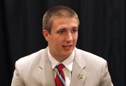 Kansas quarterback Jake Heaps conducts interviews during a breakout session at the Big 12 Conference Football Media Days Monday, July 22, 2013 in Dallas.
