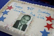 The Dole Institute of Politics at Kansas University celebrated Bob Dole's 90th birthday on Monday with cake and kid-friendly activities.