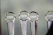 Awards at Mario Chalmers' benefit golf tournament reflect one of the beneficiaries on Monday, July 29, 2013, at Alvamar.