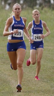 Kansas University freshmen Jennifer Angles, left, and Grace Morgan, finish second and third for the KU women's cross country team in the Bob Timmons Classic, Saturday, Aug. 31, 2013, at Rim Rock Farm.