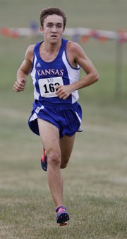 Kansas University freshman Tyler Yunk finishes first in the men's cross country race at the Bob Timmons Classic, Saturday, Aug. 31, 2013, at Rim Rock Farm.