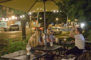 From left Stevie Reiff, Overland Park, Amanda Seurer, KU senior, Abilene, and Dani Costanza, KU senior, Overland Park, have some midnight coffee at The Java Break, 17 E. Seventh St., Friday, August 30, 2013.