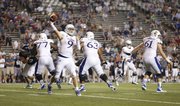 Kansas quarterback Jake Heaps throws to the sideline against Rice late in the fourth quarter on Saturday, Sept. 14, 2013 at Rice Stadium in Houston, Texas.