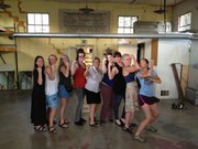 The Social Service League board of directors and staff give final a pose in their home of more than 150 years. The building will be empty for the next six to nine months as it goes through a series of repairs. In the meantime, the Lawrence community can find the League at 11th and New Hampshire. The league board and staff are, from left, Tricia Rock, Janet Cinelli, Meg Davis, MacKenzie Rose, Jan Stewart, Jenny O’Driscoll, Sara Rock, Jean Ann Pike and Kendra Davis. Janet Cinelli submitted the photo.