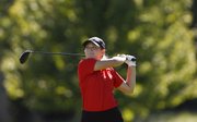 Lawrence High senior Campbell Drake watches her drive on the 18th hole during the Free State Invitational on Monday, Oct. 7, 2013 at Lawrence Country Club.