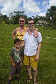 CGCHealth member Michael Tetwiler and founder Chase Hamilton stand with Jearim, a young boy from the Santo Tomas community in Peru. CGCHealth is a non-profit organization that works to provide access to clean water and medical attention to impoverished areas in the Amazon.