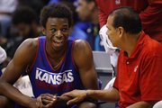 Kansas forward Andrew Wiggins laughs with assistant coach Kurtis Townsend during an open-practice scrimmage on Saturday, Oct. 19, 2013 at Allen Fieldhouse.