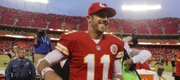 Chiefs quarterback Alex Smith (11) smiles as he leaves the field following a 17-16 victory over Houston on Sunday in Kansas City, Mo.
