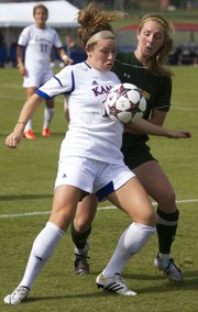 Kansas forward Caroline Kastor steps in front of Baylor's Hadley Young to take control of the ball during their game Sunday at the Jayhawk Soccer Complex.