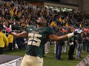 Baylor running back Lache Seastrunk celebrates a touchdown — one of many — against Iowa State. The Bears and their awesome offense beat ISU, 71-7, a week ago in Waco, Texas. Next up, Baylor will take on Kansas at Memorial Stadium.