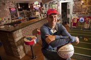 Pat Sullivan's Jayhawk memorabilia fills his downstairs recreation room, bar and even a bathroom. He has memorabilia from a number of KU sports, and lots of tickets to help him remember big games.