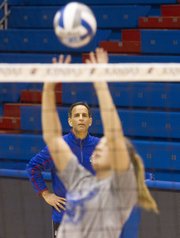 Kansas volleyball coach Ray Bechard watches his team run through drills during an open practice Thursday at Allen Fieldhouse. The Jayhawks open the NCAA tournament Friday against Wichita State.