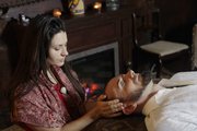 Autumn Magiera provides a healing reiki treatment on Andy Claypool at Elevate. The two are owners of the business, a full-service holistic treatment center that specializes in reiki.