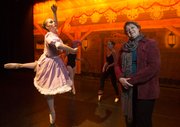 Candi Baker, right, the founding director of the School of Dance at the Lawrence Arts Center who retired this year, stands with some of the dancers performing in this year&squot;s production of "A Kansas Nutcracker" on at the Arts Center.