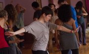 Kayla Williams participates in the annual Sweat Your Prayers for the New Year event on Wednesday at Be Moved Studio.