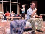 From left, actors Dustin Chase, Alice Dale, Erica Fox and Brian Williams perform a scene from Theatre Lawrence’s production of “Wrong Window,” a spoof of Hitchcock films. The play begins its run Friday.