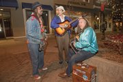 From left, members of a zydeco band who play regularly at 8th and Massachusetts: Barry Barnes, Michael Bradley, and Tommee Sherwood.
