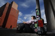 Lawrence musician and street performer Mike Calvillo says he will often play his guitar 4-5 times a week downtown when the weather is warm.