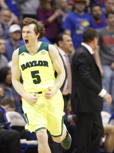 Baylor guard Brady Heslip celebrates after a three against the Jayhawks during the first half on Monday, Jan. 20, 2014 at Allen Fieldhouse.
