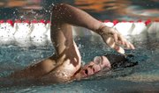 Lawrence High's Tristan Hantula competes in the 200-yard freestyle during the Lawrence Invitational on Thursday at LHS. The Lions' swimming and diving team finished second at their home invitational.