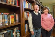Malcolm Gibson, retired Kansas University journalism professor, and his wife, Joyce, at their home in West Lawrence on Sunday.