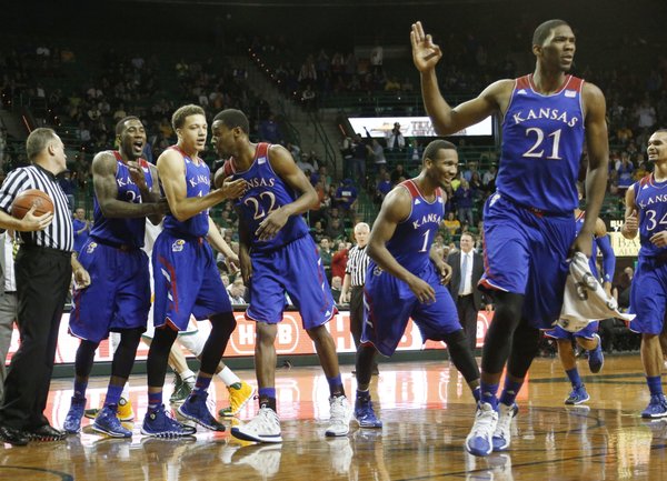 From left Jamari Traylor and Brannen Greene congratulate Andrew Wiggins, center, after Wiggins hit a long three-point basket to end the first half. Also celebrating at right are Wayne Selden and Joel Embiid Tuesday, Feb. 4, 2014 at Ferrell Center in Waco, Texas.