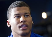 KU defensive back Ronnie Davis visits with the media during a news conference Wednesday, Feb. 12, 2014.