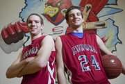 Eudora High senior Andrew Ballock, left, and his brother, freshman Mitchell, play together for the Cardinals’ boys basketball team. Mitchell is already drawing attention from Division I basketball programs and attributes his success to the backyard basketball beatdowns he endured at the hands of his older siblings while growing up.