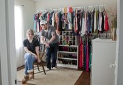 Max Greenwood turned a second bedroom in his home into a giant walk-in closet for his fiancee Emily Kuykendall. A clothes rack system and some salvaged shelves, offering slots for pairs of shoes, runs the length of one wall. A vanity table and mirrors and a dresser are along the other walls.