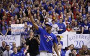 Kansas guard Andrew Wiggins, who most likely will enter the NBA Draft waves to the fieldhouse prior to the senior speeches on Wednesday, March 5, 2014 at Allen Fieldhouse.