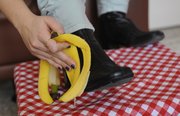 Household items and foods, like bananas, can be used to complete general cleaning tasks, like shining shoes.