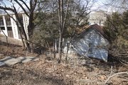 This house at 1115 Indiana Street sits between two apartment complexes at the bottom of a hill on the west side of Indiana.
