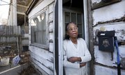 In this March file photo, Lawrence resident Georgia Bell, who is 91 and lives at 1115 Indiana Street, talks about her dealings with developers who have expressed their interest in buying her property, which is surrounded on three sides by the Berkeley Flats apartment complex.