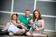 Vic Tranckino and Karla Holton with their children, Kylie Tranckino, 6, and Lance and Blake Tranckino, who recently underwent reconstructive brain surgery.