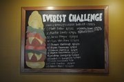 Richard Gwin/Journal World Photo.Names of those who have taken on the challenge of eating the "Everest Challenge", at the 23rd Street Brewery.