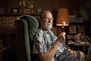 Tom Moore, of Kansas City, Kansas is an accomplished painter who switched over to sketching when Parkinson's developed and he had to start working with other mediums. Moore has an exhibition at the Lawrence Arts Center that shows some of his sketches.