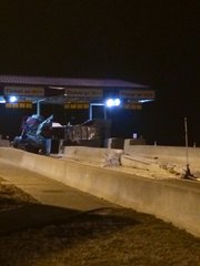 One person died and another is in critical condition after a tractor-trailer hit a tollbooth on the Kansas Turnpike in Leavenworth County about 3 a.m. Saturday.