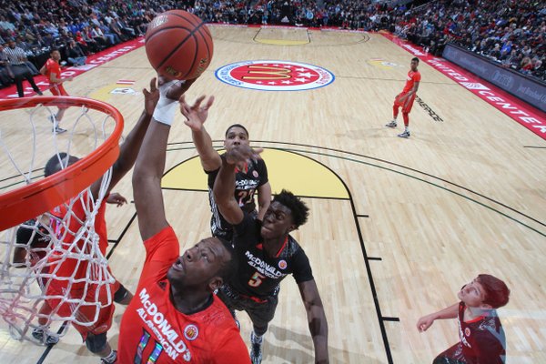 Cliff Alexander, a 6-foot-9 post player out of Curie Metro High, in Chicago, gets his hand on a rebound at the McDonald's All American Game Wednesday at Chicago's United Center. Alexander finished with nine points and 11 rebounds in his East team's 105-102 loss.
