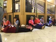 Teachers who converged on the Kansas Statehouse this week found various ways to pass the time as they waited for the House and Senate to start debating a school finance bill. They urged lawmakers not to include language that would also repeal the rights of teacher tenure in Kansas.