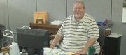 Bill Mason has been volunteering with the Bonner Springs Police Department for 12 years, though his record of service extends much further than that, including 10 years as a volunteer firefighter. He continues to volunteer even after losing both legs below the knee due to diabetes.