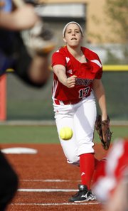 Lawrence High's Megan Sumonja delivers a pitch against Olathe South in a doubleheader Tuesday at LHS.
