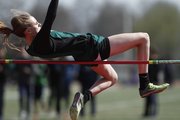 Free State freshman Natalie Clarke makes an attempt at clearing the bar while competing in the girls high jump event of the LHS Invitational on Wednesday, April 16, 2014 at Lawrence High School.