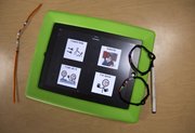 Some local students with autism are using an iPad app like this one to make commands and ask questions as part of a Kansas University research project.