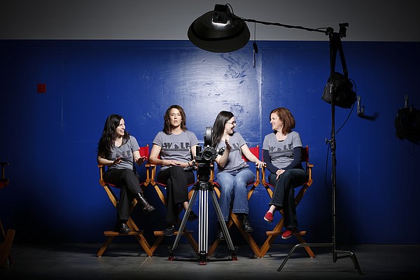 The founding members of the Women of Lawrence Film, or WOLF, from left, Marlo Angell, Laura Kirk, Misti Boland and Christie Scanlin Dobson are pictured at Through A Glass production studio, 720 E. Ninth St. The group of local filmmakers came together to mentor young women while making a series of short films. 