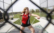 Lawrence High's Rebecca Finley prepares to throw the discus on Friday, April 25, 2014, at Free State High.