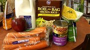 Elliot's items:
Grains: brown rice, $1
Fruits: Apples, 60 cents
Vegetables: Carrots, $1.29 and frozen corn, $1.40
Protein: Southwest style beans, 99 cents
Dairy: Half gallon of 2 percent milk, $3.98
Total price: $9.26
Suggestions: Items span each of the food groups, but could swap out an item or two to make it a more complete meal.