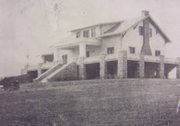 Shown here is the original club house of the Lawrence Country Club, which celebrates its 100th anniversary this summer.
