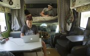 Maria Scarpello and Brian Devine 31 live and work in their 29-foot 1999 Ford Jayco Class C motorhome.