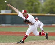 Lawrence High starter Bryce Montes de Oca delivers to the plate during the second inning against Olathe East on Thursday, May 8, 2014 at Lawrence High School.