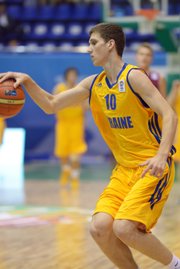 Sviatoslav Mykhailiuk of Ukraine competes during the U16 Eurobasket 2013 first-round match between Ukraine and Latvia at Palace of Sport in Kiev, Ukraine, on Aug. 8, 2013.